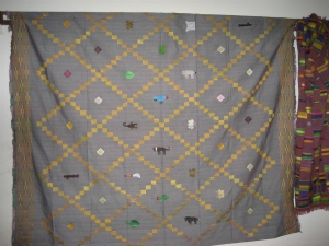 A diamond kente with animal patterns