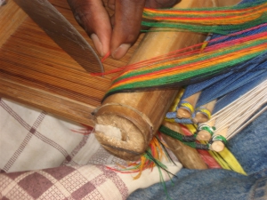 Sleying the Reed for Kente Weaving