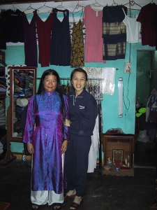 Tien in ao dai with Tailor-shop Owner