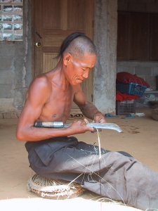 Akha Man Making Bamboo Ties