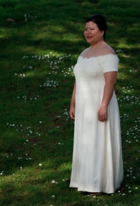 three-quarter view of handwoven wedding dress