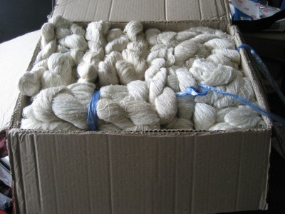 A big box full of hand-reeled silk from Laos