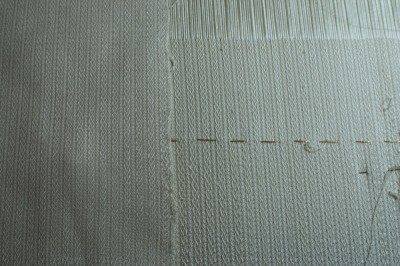 Samples for the wedding dress fabric.  On the left, the original sample; right top (above gold line), sample using 140/2 silk as weft; right bottom (below gold line), sample using 60/2 silk as weft.
