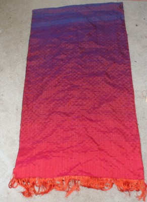 Full view of woven iridescence shawl