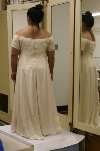 handwoven wedding dress, partially complete, back view