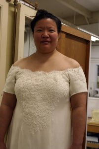handwoven wedding dress, partially complete, closeup of front