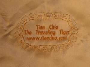 machine embroidered label for handwoven wedding dress
