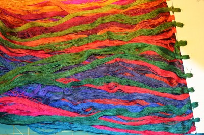 piles of dyed sample skeins