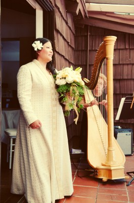 Tien with harpist