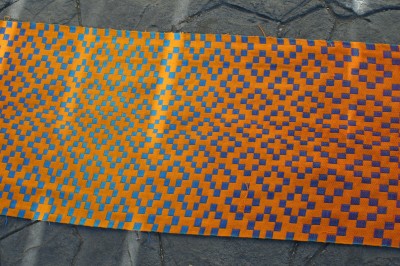 Second handwoven doubleweave shawl, orange side, center view
