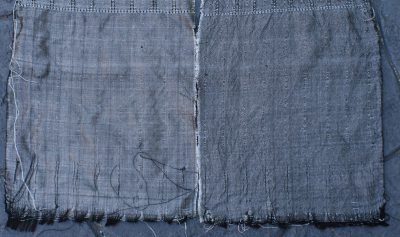 Plain weave with white 60/2 silk weft, beaten firmly.  Warp is black 60/2 silk sett at 40 epi.