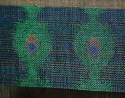 handwoven peacock feather design, in five-weft taquete