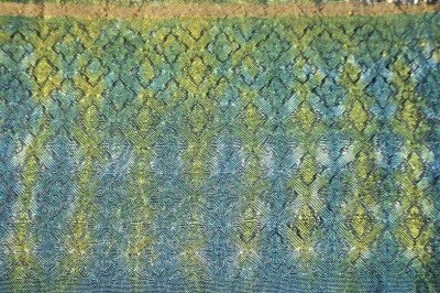 Woven shibori sample #2, widely spaced weft ties (~23 threads apart), painted yellow on one side and blue on the other, reverse side