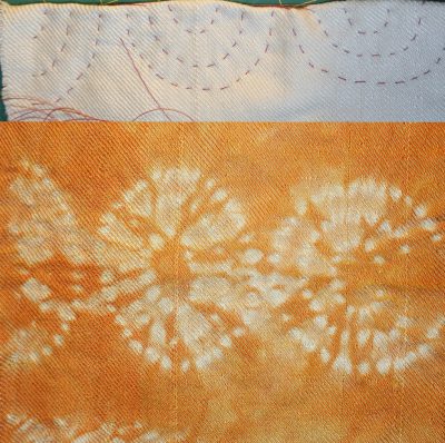 stitched shibori, orange circles, stitched on fold