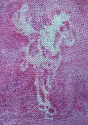 horse, scrunch dyed in turquoise/purple fiber reactive dyes, then stenciled with acid dyes. 3-1 twill with acid dye dominant.