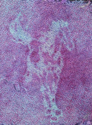 horse, scrunch dyed with turquoise and purple fiber-reactive dye and then stenciled with acid dye in fuchsia.  Crepe weave.