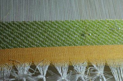 beginning, green tencel and gold embroidery thread weft