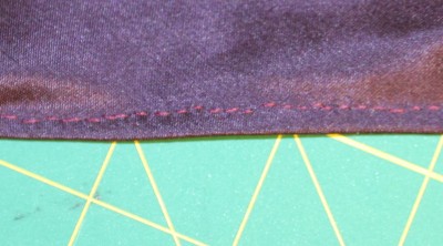 prick-stitched edge, on the private side