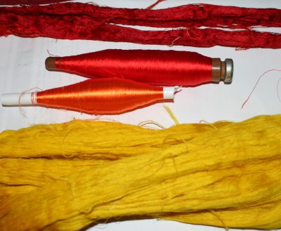 dyed silk, skeins and pirns