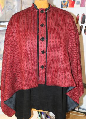 semi-finished cape, with inset Celtic braid fabric
