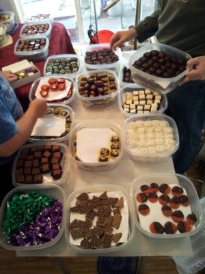 Rearranging the top layer of chocolates for more efficient packing