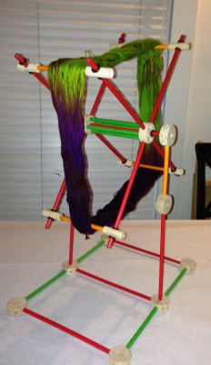 assembled Tinkertoy swift with a skein of yarn