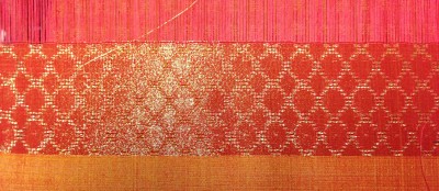 sample with metallic gold weft, on loom
