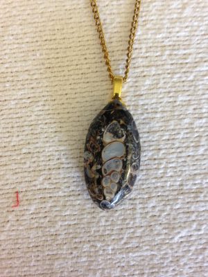 stone pendant, carved by Mom