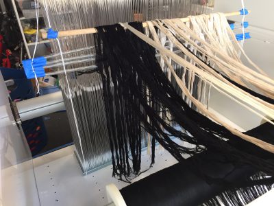 black and white warps, ready for threading onto the TC-2