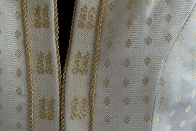close-up of Tien's handwoven wedding coat