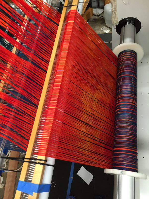 2nd red warp going onto the loom