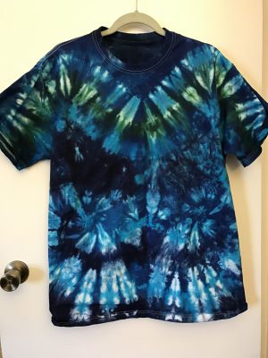 green and blue tie-dyed shirt