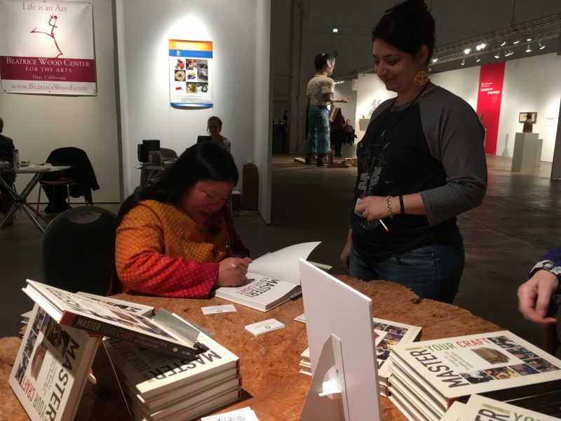Signing books at SOFA Chicago