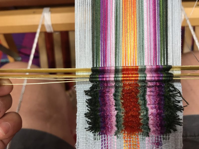 Velvet weaving showing rods