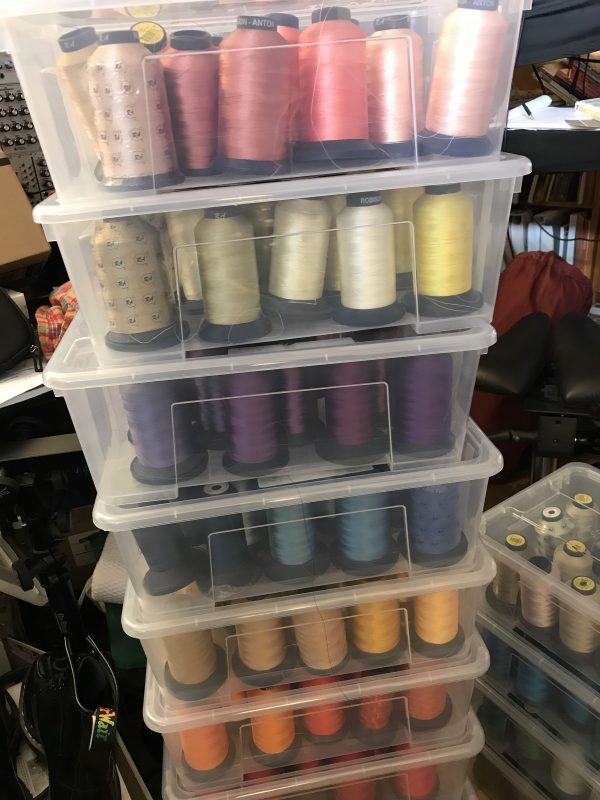 Boxes of rayon machine embroidery thread