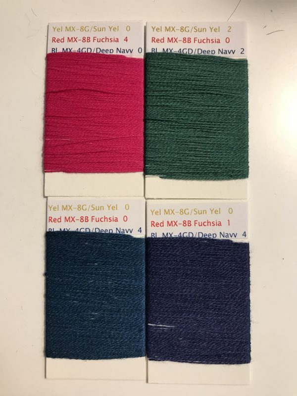 four dye swatches - fuchsia and green on top