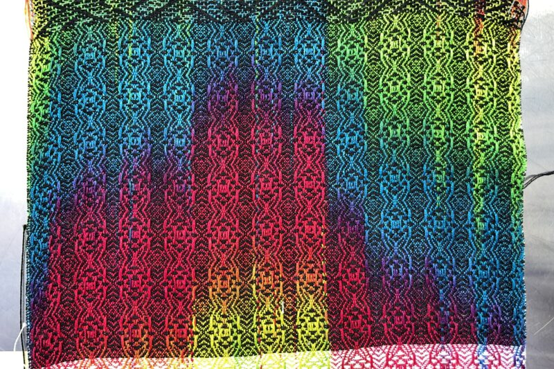 painted warp swatch with rainbow colors